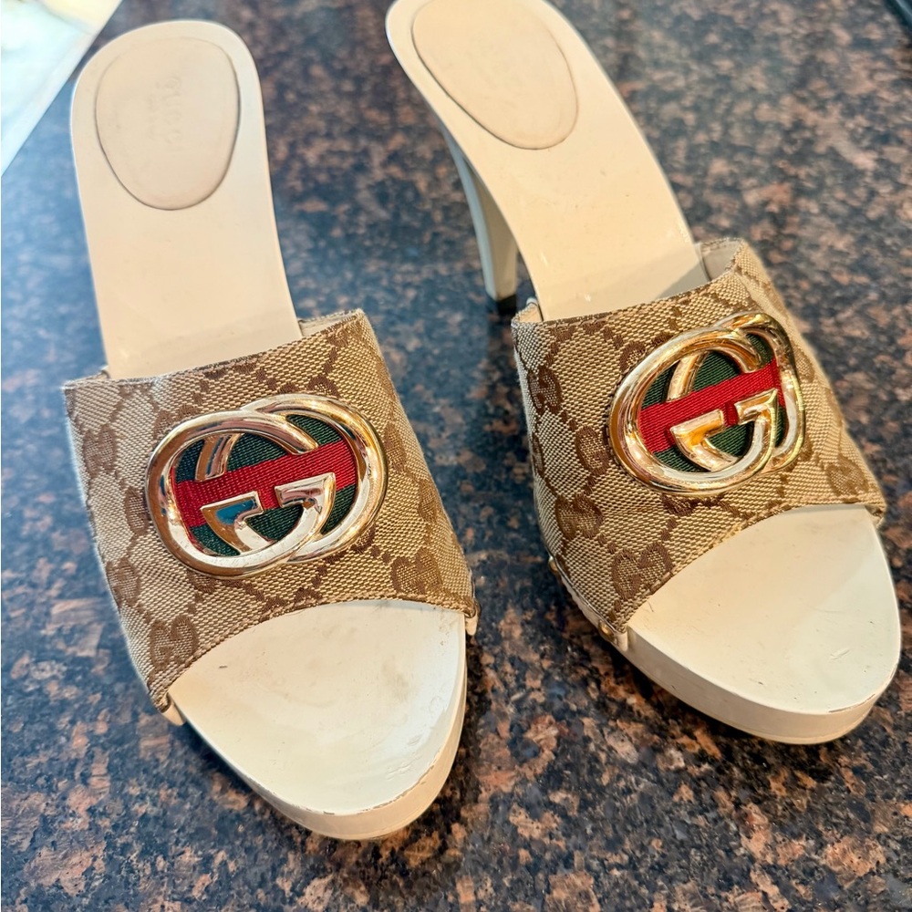 Gucci Beige Monogram Mules with Gold Accents